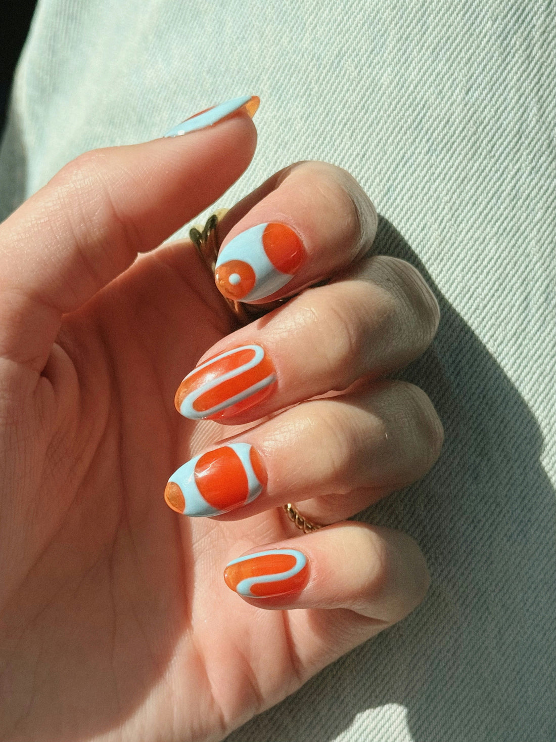 Autumn pumpkin spice press-on nails by GLITZADORA — cozy fall manicure trend 2025 with warm orange tones